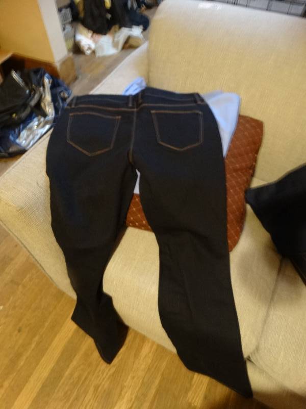 lot 6875 image: 3 Pairs of brand new jeans size 13 & 14 and a scrub top.