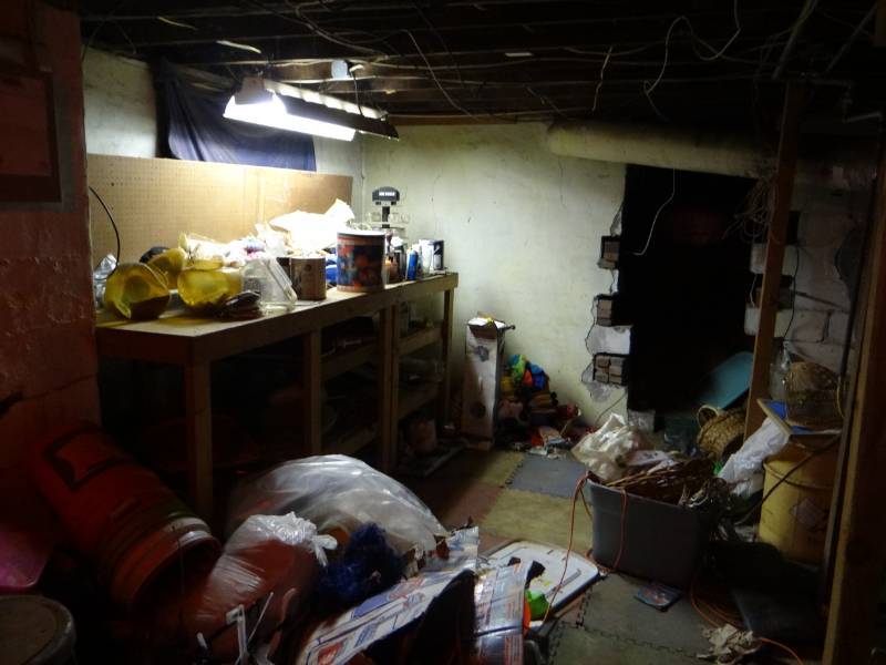 lot 6928 image: All contents in  basement holiday decor, toys, shelfs, file cabinet and much much more.