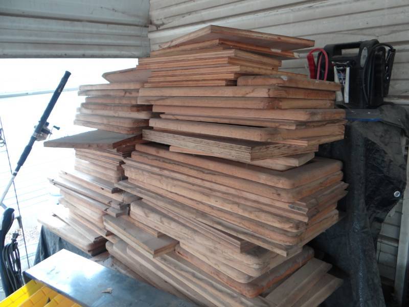 lot 6932 image: Large lot of various cabinet doors and miscellaneous wood.