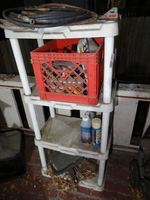 lot 6950 image: Small plastic shelf with contents.