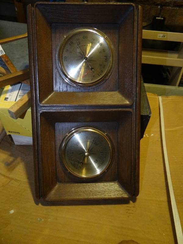 lot 6954 image: Thermometer barometer.