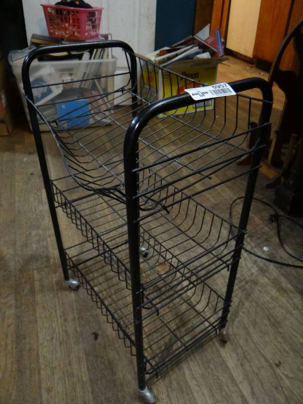 lot 6957 image: Small metal cart on wheels.