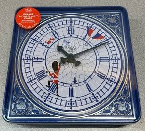 lot 6506 image: M&S Food Orange Flavored Jaffa Cakes Tin Clock 13.2oz (Exp. 01132026)