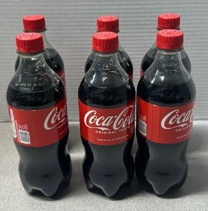 lot 6689 image: Coca-Cola Original 6 Pack Plastic Bottles (Exp. 42026)