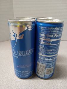 lot 6719 image: Red Bull The Sea Blue Edition Juneberry Energy Drink 250 mL 4-Pack Best by 52127