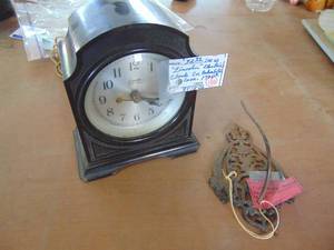 lot 4256 image: Vintage Clock and Cast ticket Holder
