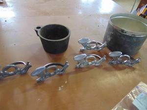 lot 4257 image: Lead Trinkets in Cast Mug