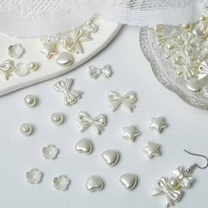 lot 18321 image: Juexica 500 Pcs ABS Imitation Pearl Beads Star Heart Bowknot Circle Flower White Aesthetic Beads for Jewelry Making Bracelets Necklaces Earrings Key Chains Accessories DIY Crafts(Classic Style)