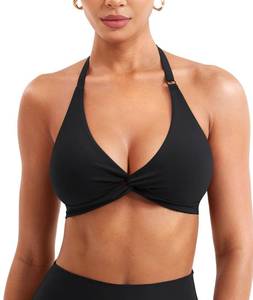 lot 58278 image: Halter Sports Bras for Women Low Impact Removable Padded Adjustable Front Twist Deep V Bra Seamless Workout Gym Crop Tops Black S - Retail $20