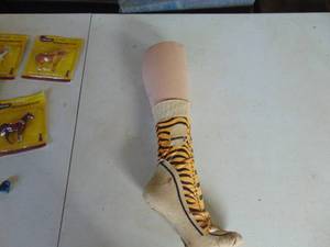 lot 4390 image: Mannequin Foot with Cincinatti Bengals Sock
