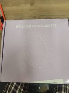 lot 29 image: Weighted Fitness Hula Hoop with Ball - Retail $25