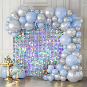 lot 34 image: Shimmer Wall Backdrop Iridescent Silver Wall Panels 24Pcs Square Sequin Shimmer Wall Backdrop Decoration for Birthday Party,Wedding, Anniversary - Retail $65