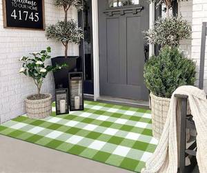 lot 982 image: Green and White Outdoor Rug 3X 5 Buffalo Checked Porch Rug Cotton Woven Machine Washable Layering Door Mat for Welcome Door Mat Porch Entryway Bedroom Living Room - Retail $20