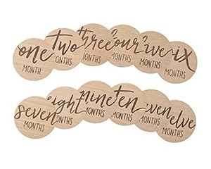 lot 2933 image: Kate & Milo Baby Monthly Milestone Marker Discs, Reversible Photo Props, Baby Growth and Pregnancy Growth Cards, Wooden (B08WQYX5J3) - Retail $16
