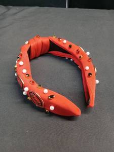 lot 3170 image: Red Football Knotted Headband   -