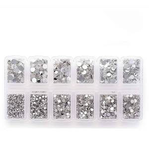 lot 3712 image: 4200 Pack Clear Flat Back Rhinestones for Craft, Round Crystal Gems Stickers for Clothes, 1.5 mm - 4.8 mm, 6 Sizes - Retail $6