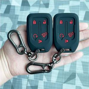 lot 63550 image: 2PCS Silicone Smart Key Fob Cover for 2023 2022 2021 2020 2019 GMC Sierra and Chevy Silverado 1500 2500HD 3500HD, Remote Protector Case(5-Button,Black and Black) - Retail $10