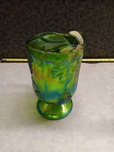 lot 2 image: Green Carnival Glass Pitcher with Grape and Leaf Pattern