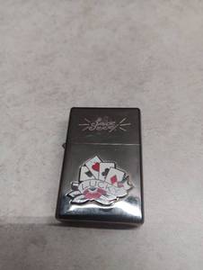 lot 322 image: Sailor Jerry Lucky Cards Zippo Lighter