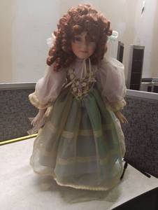 lot 354 image: Porcelain Collector Doll with Red Curly Hair and Floral Dress