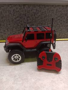 lot 366 image: Red RC Off-Road Jeep Wrangler Style Truck with Remote Control