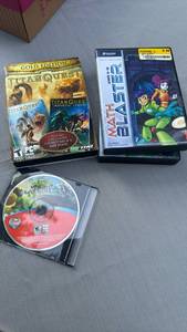 lot 888111 image: PC CD-ROM Game Lot - Titan Quest Gold Edition, Plants vs Zombies, and Math Blaster