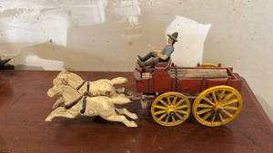 lot 60637 image: Cast Iron Horse-Drawn Lumber Wagon Toy