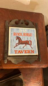 lot 60650 image: 1783 Black Horse Tavern Cast Iron and Ceramic Tile Wall Sign