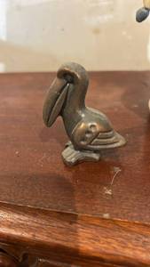 lot 60656 image: Small Cast Metal Pelican Figurine