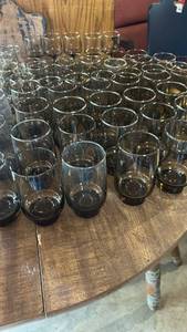 lot 60682 image: Large MCM Collection of Smoked Brown Glass Drinkware Set