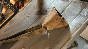 lot 60685 image: Hand Forged Iron Cowbell with Strap