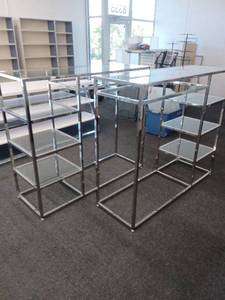 lot 40867 image: Metal Frame Display Shelving Unit 4-Tier Glass Shelves Set of 2 62in x 21in x 54in  from Forever 21 - Retail $250