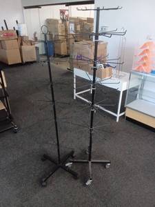 lot 40869 image: Clothing Rack Spinner Display Stand with Wheels 2 Pack