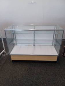 lot 40888 image: Glass Display Case Cabinet with Sliding Glass Doors and Interior Shelving 48in x 20in x 38in  - Retail $950