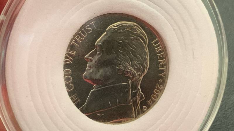 lot 13 image: 2004-D Jefferson Nickel Coin Louisiana Purchase on reverse in Protective Holder BU Brilliant Uncirculated