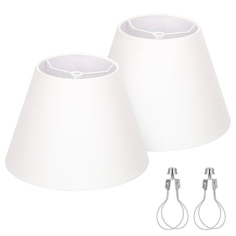 lot 1067 image: Small Lamp Shades Set of 2, White 5.5 Top x 10 Bottom x 6.6 High, Fabric Replacement-Spider Fitter, Clip on Adapters Included Retail $35
