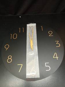lot 1055 image: Wall Clock with Pendulum, Black Dial, Gold Numerals, 12 Inch - Retail $23
