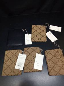 lot 1095 image: Set of 5 Passport Case - A New Day  1 Black, 4 Brown Solid Holder - Retail $40