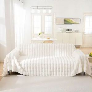 lot 1077 image: AMWAN Cozy Faux Fur Couch Cover Large Fuzzy Blanket 71x134 - Retail $65