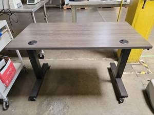 lot 17635 image: Uline Mobile Work Table with Gray Wood Top and Cable Ports