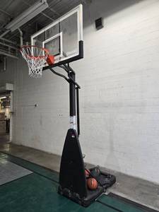 lot 17815 image: Spalding Portable Basketball Hoop System with Backboard and Rim and Basketballs and Pumps