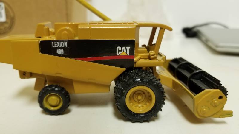 lot 1356 image: CAT Caterpillar Combine - says custom made, you decide