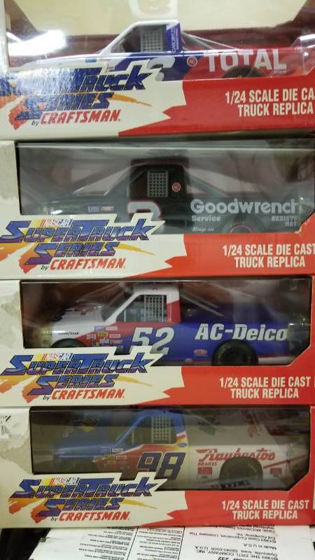 lot 1399 image: Lot of 4 Craftsman Super Truck Series 124 Scale Trucks