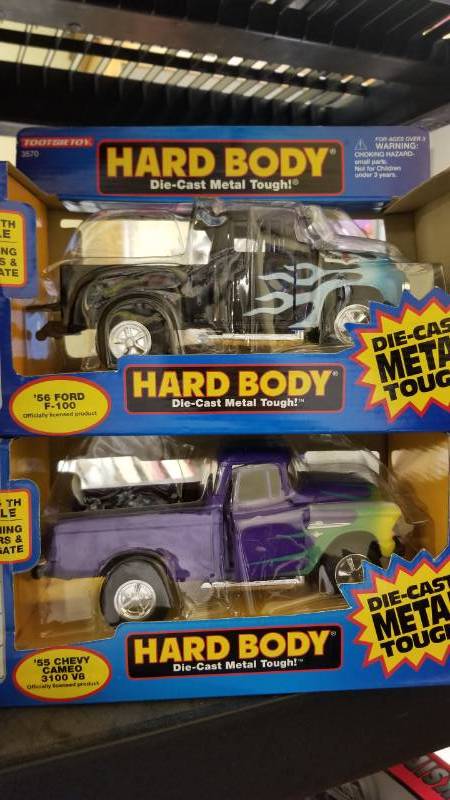 lot 1402 image: 56 Ford F100 and 55 Chevy Cameo 3100 V6 diecast trucks