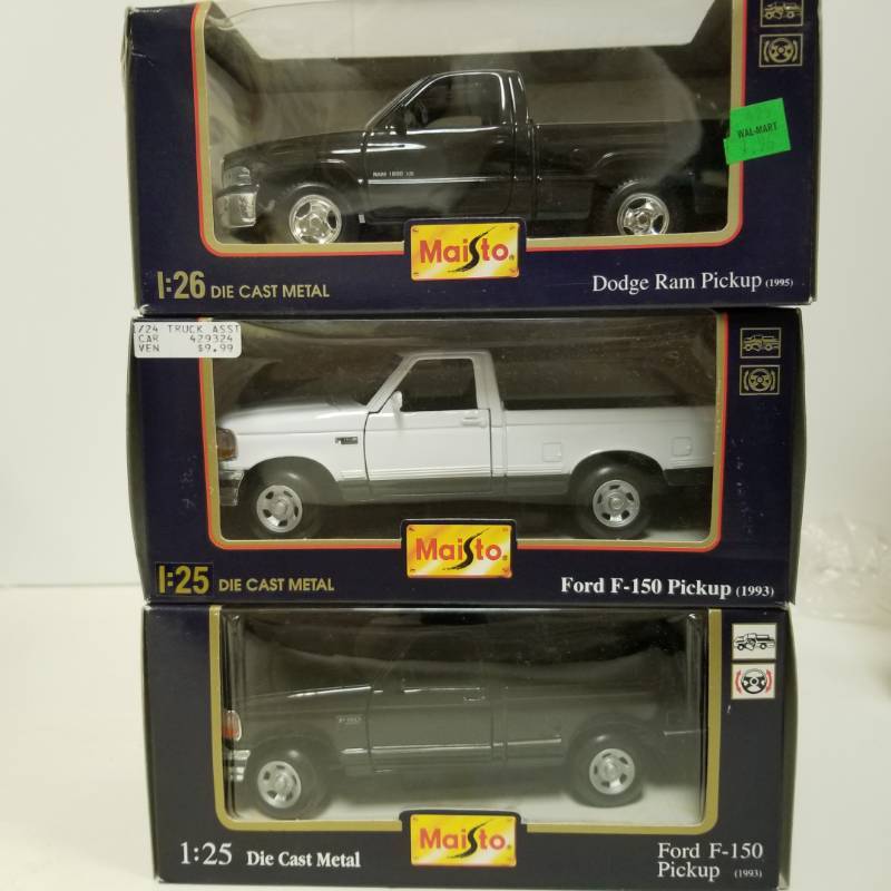 lot 1424 image: Dodge Ram 1500 and Ford f150s