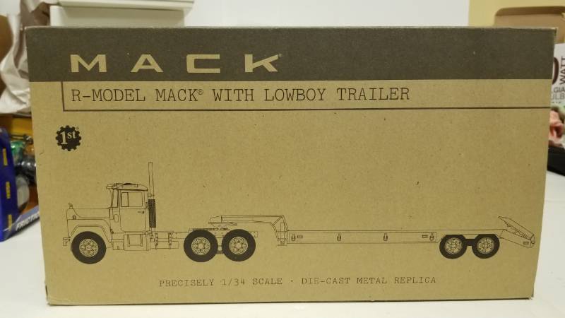 lot 1541 image: Gradall Mack by First Gear Flatbed Trailer