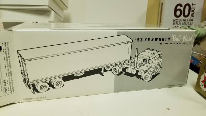 lot 1542 image: P.I.E. 53 Kenworth Bull-Nose First Gear Truck and Trailer
