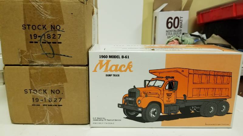 lot 1555 image: Pair of Mack 1960 B61 Dump Trucks by First Gear