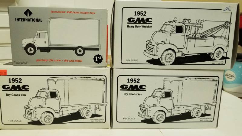 lot 1562 image: Lot of 4 First Gear Trucks