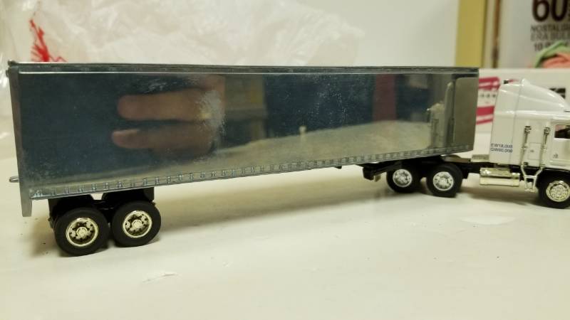 lot 1593 image: Shiny steel  aluminum trailer and cab